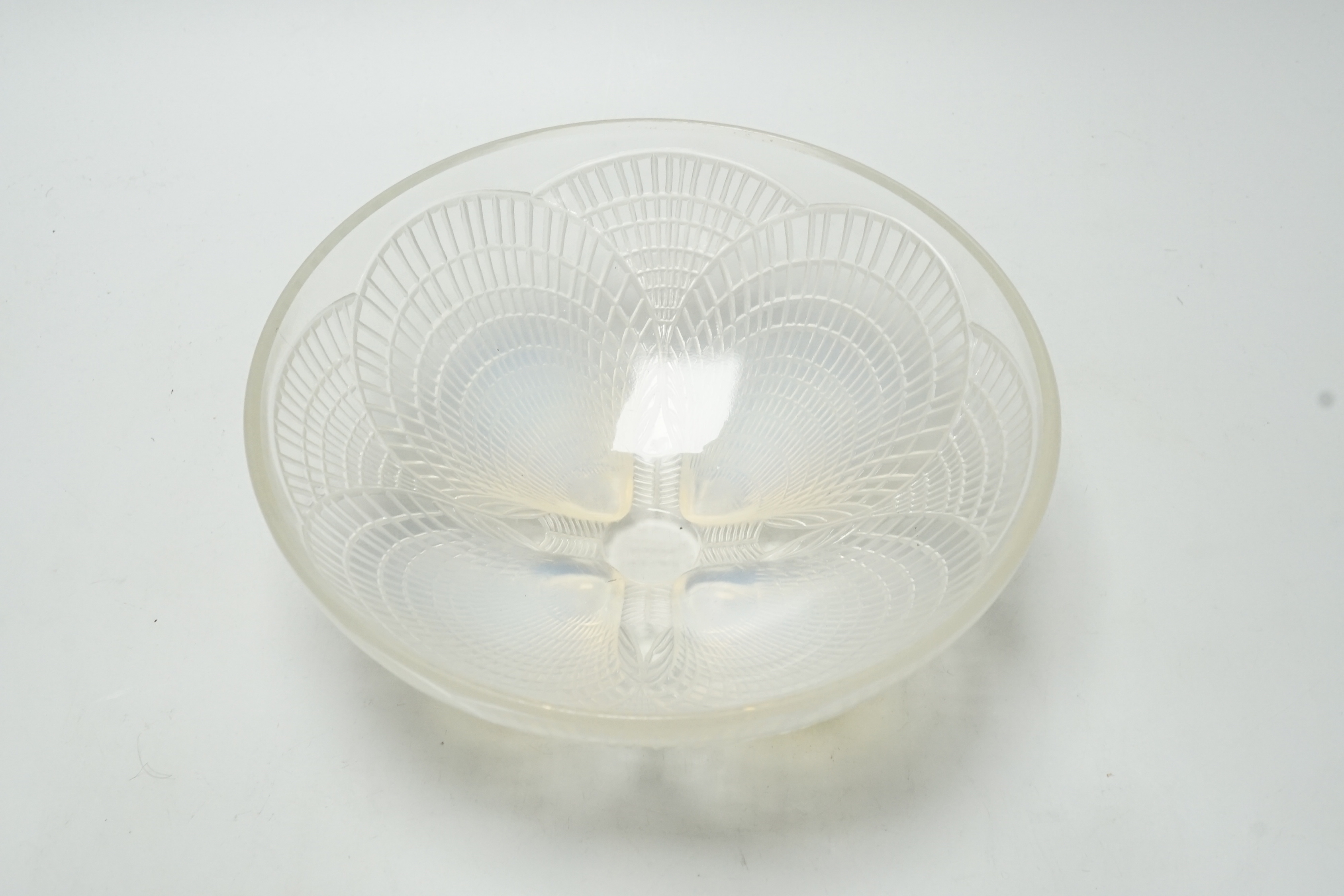 A Lalique opalescent glass Coquilles pattern bowl, moulded ‘’R. LALIQUE’’ mark, 21cm wide